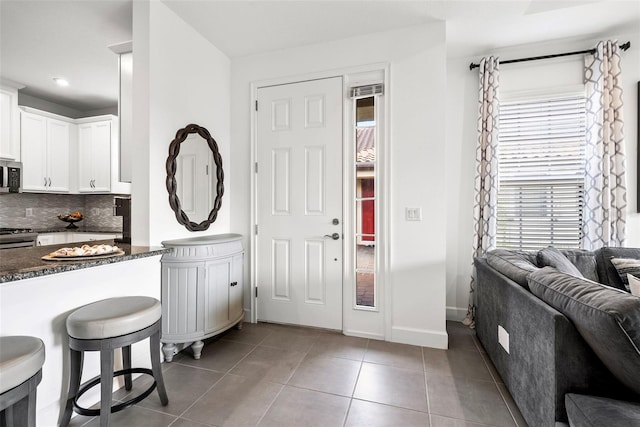 entrance foyer featuring tile patterned floors