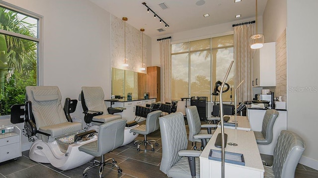 office featuring rail lighting