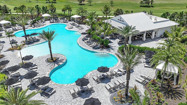 view of swimming pool featuring a patio