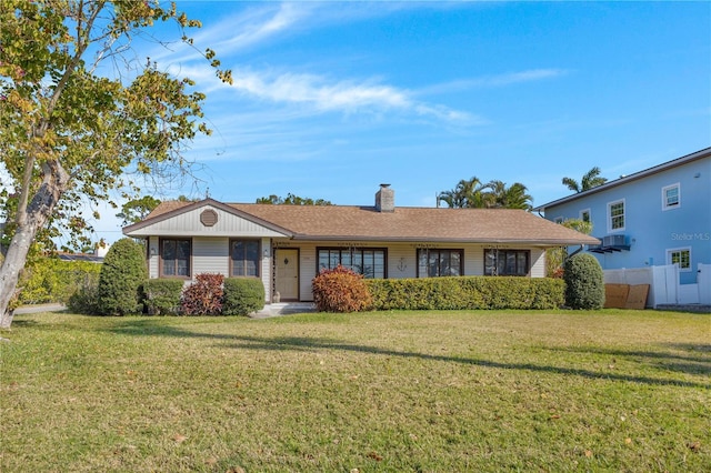 ranch-style home with a front yard