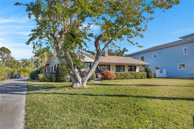 1103 Palma Sola Blvd, Bradenton, FL 34209 - view of front of house with a front yard
