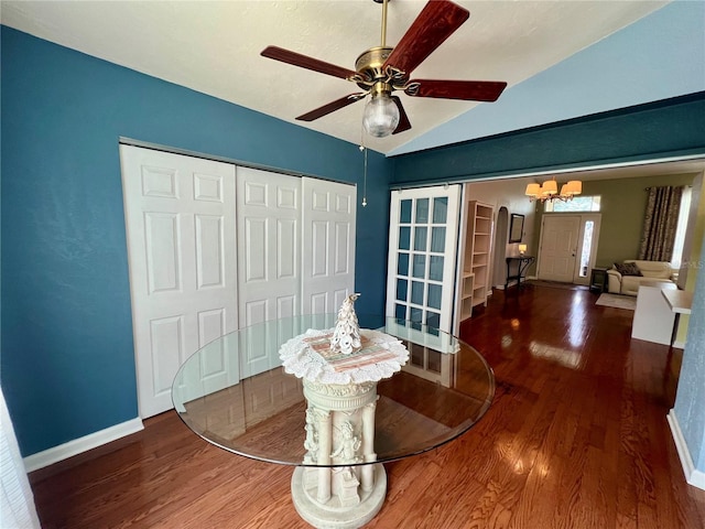 503 Philodendron, Punta Gorda, FL 33955 - interior space with dark wood-style floors, baseboards, vaulted ceiling, and a ceiling fan