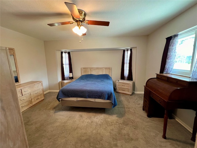 503 Philodendron, Punta Gorda, FL 33955 - bedroom featuring carpet, ceiling fan, a textured ceiling, and baseboards
