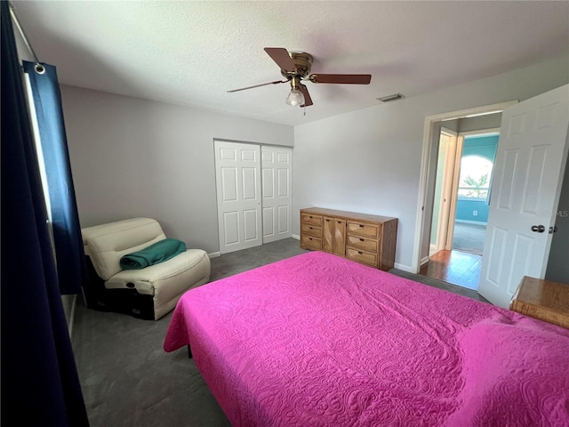 503 Philodendron, Punta Gorda, FL 33955 - bedroom with ceiling fan, visible vents, baseboards, a closet, and dark carpet
