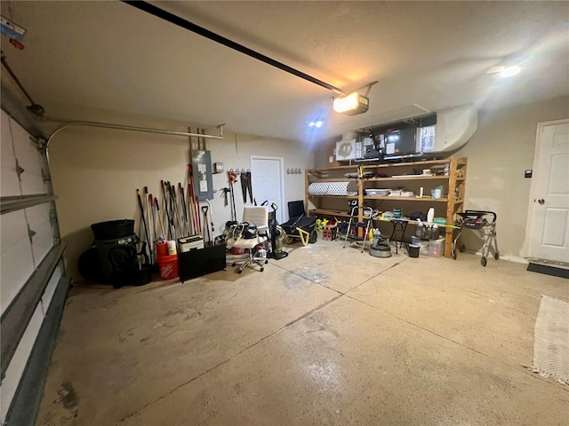 503 Philodendron, Punta Gorda, FL 33955 - garage featuring electric panel and a garage door opener