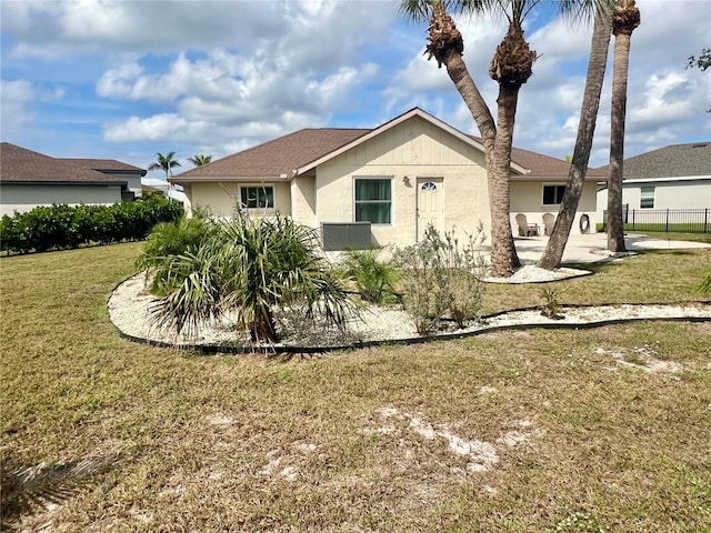 503 Philodendron, Punta Gorda, FL 33955 - view of front facade with a front lawn and stucco siding