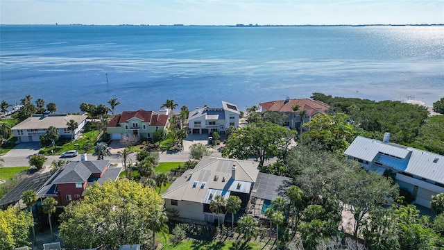 aerial view with a water view and a residential view