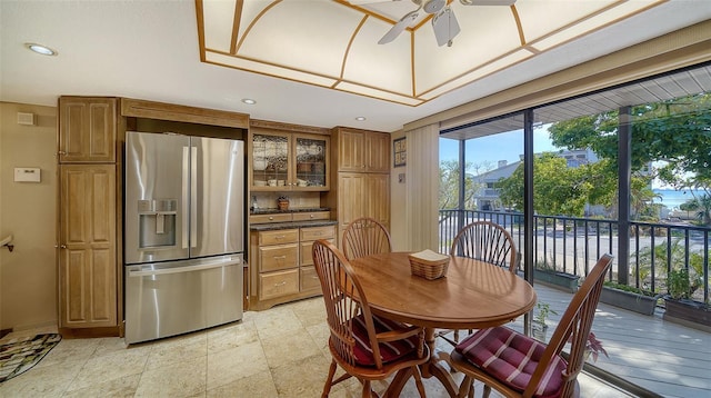 dining room with a ceiling fan and recessed lighting