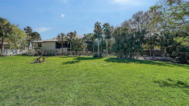 view of yard with fence