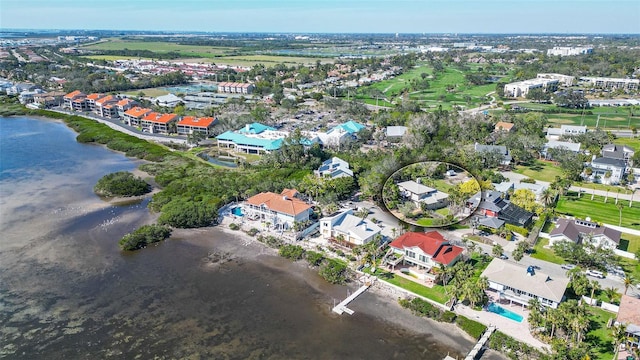 bird's eye view featuring a water view and a residential view