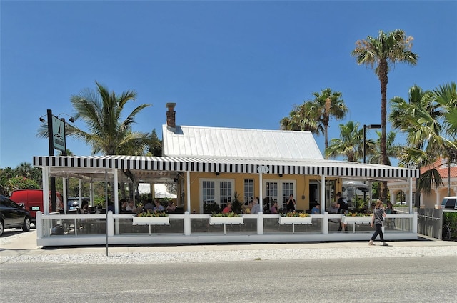 view of building exterior with a fenced front yard