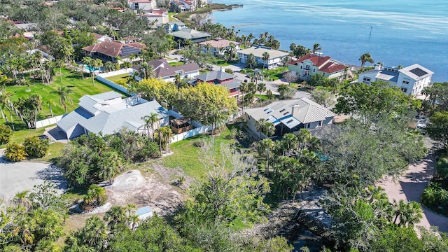 bird's eye view with a water view and a residential view