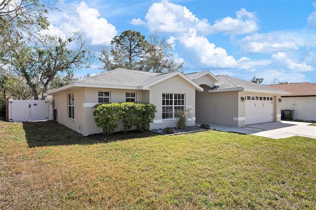 ranch-style house featuring a garage, a front lawn, concrete driveway, and stucco siding