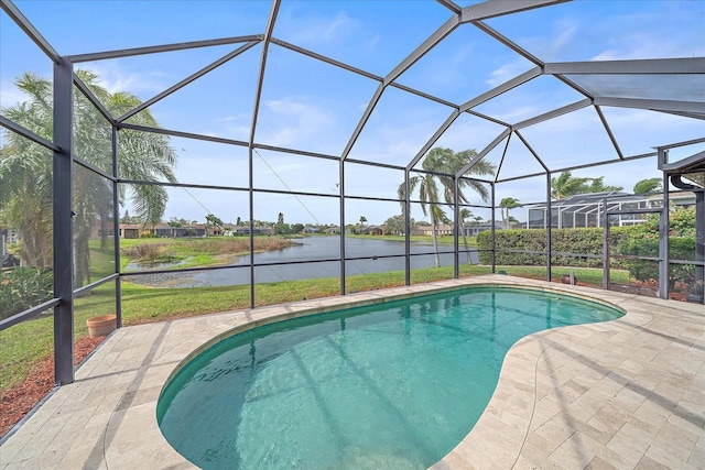 outdoor pool featuring a patio area, a lanai, and a water view