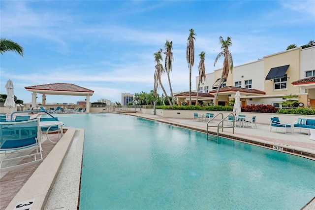 pool featuring a patio area and a gazebo