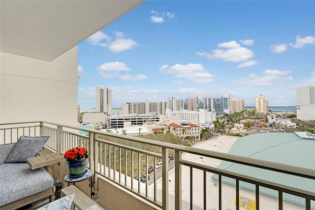 balcony featuring a view of city