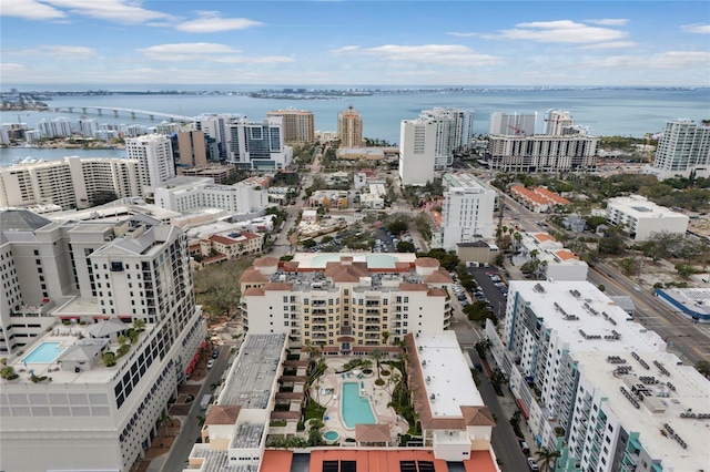 bird's eye view featuring a water view and a city view