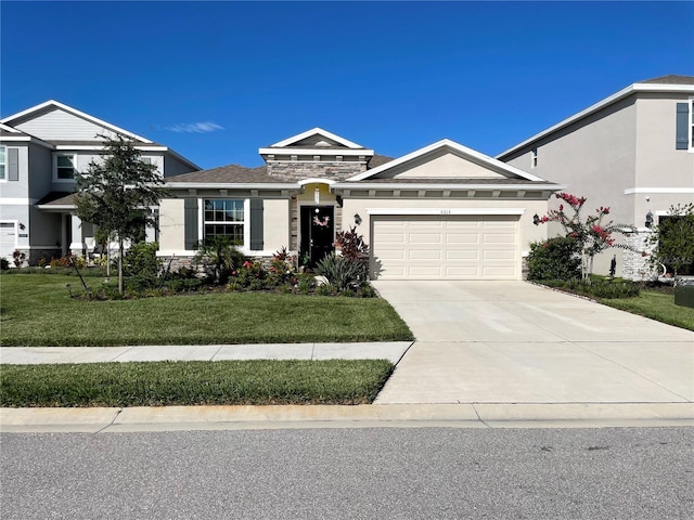 view of front of house featuring an attached garage, stone siding, stucco siding, a front yard, and driveway
