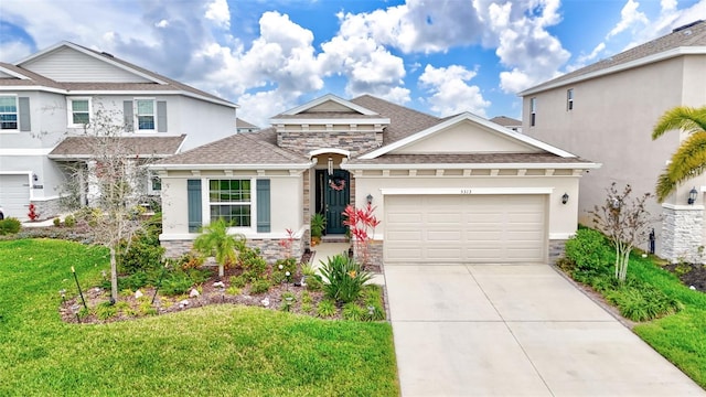 view of front of house with stone siding, driveway, a garage, stucco siding, and a front lawn