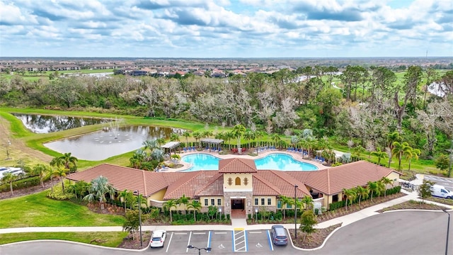 drone / aerial view with a water view