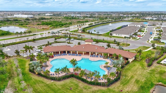 birds eye view of property featuring a water view