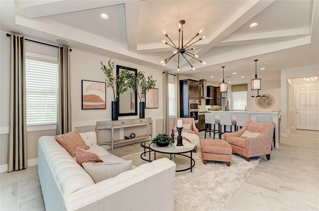 living room featuring coffered ceiling, beamed ceiling, and a notable chandelier