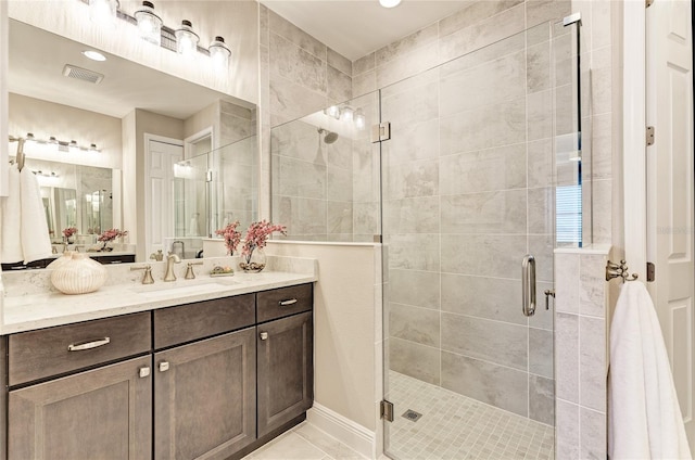 bathroom featuring vanity and walk in shower