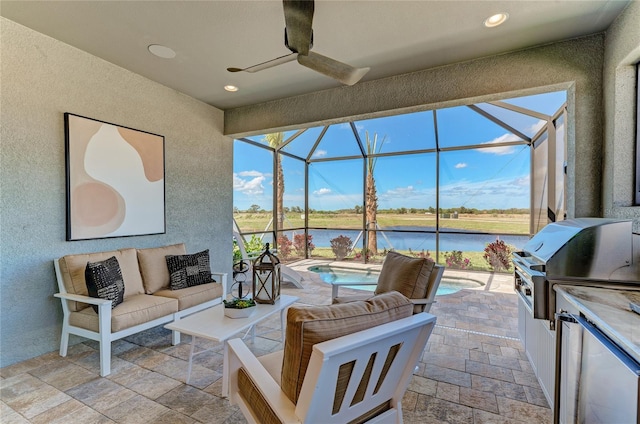 interior space featuring a water view and ceiling fan