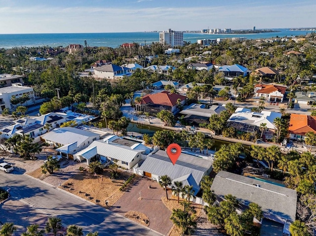 aerial view featuring a water view and a residential view