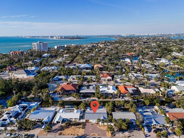 aerial view featuring a residential view and a water view