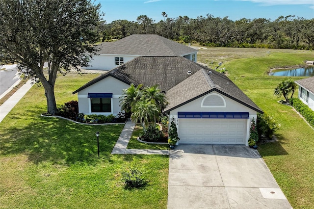 view of front of home with stucco siding, roof with shingles, concrete driveway, an attached garage, and a front yard