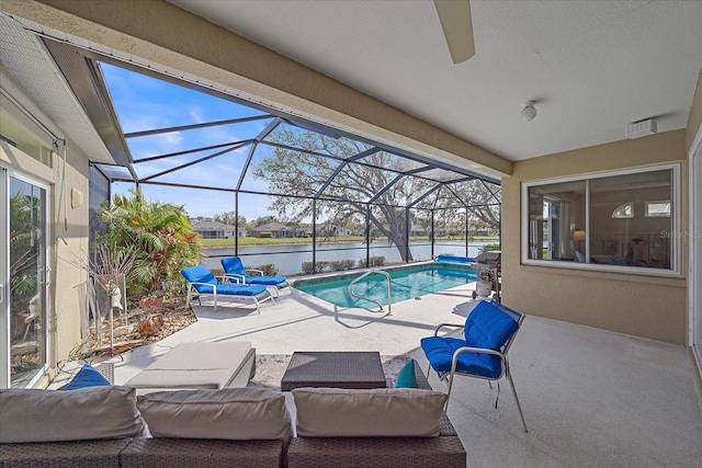 view of swimming pool featuring a patio, an outdoor living space, a water view, and a lanai