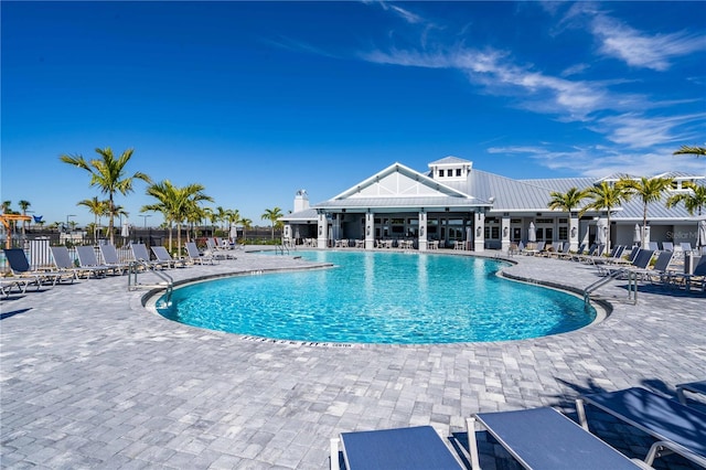 view of swimming pool featuring a patio