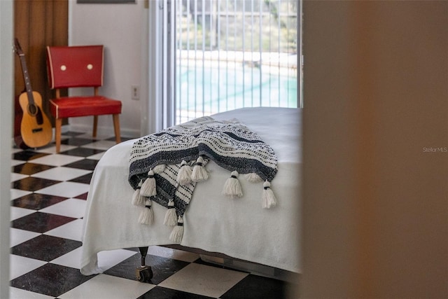 bedroom with tile patterned floors