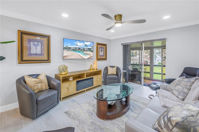 living room with a fireplace, baseboards, crown molding, and recessed lighting