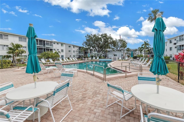 pool with a patio