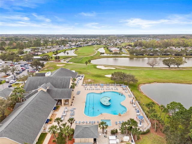 drone / aerial view with a residential view and a water view