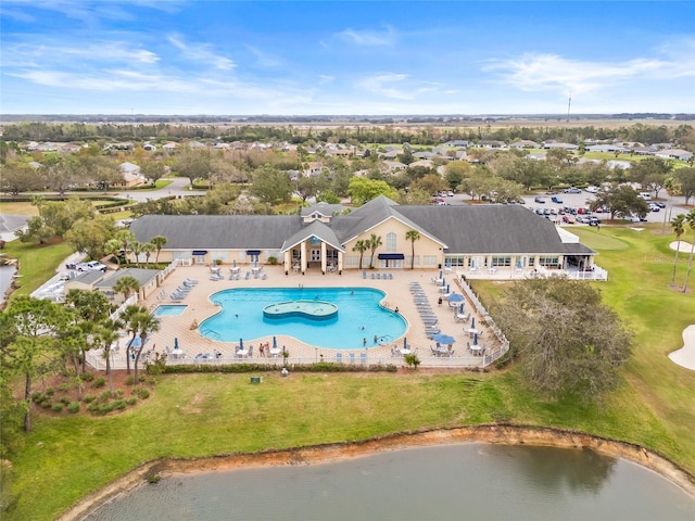 birds eye view of property with a water view