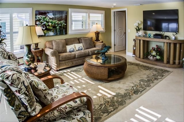 living area featuring light tile patterned floors