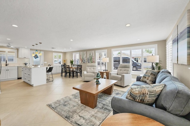 6140 Midnight Pass Rd Unit A10, Sarasota, FL 34242 - living area featuring recessed lighting and light tile patterned flooring
