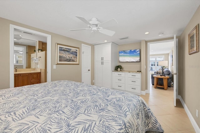 6140 Midnight Pass Rd Unit A10, Sarasota, FL 34242 - bedroom with light tile patterned floors, a closet, recessed lighting, ceiling fan, and ensuite bath