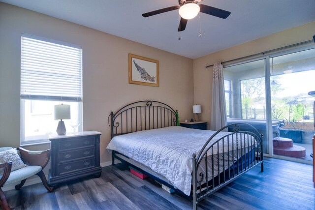 bedroom featuring ceiling fan, wood finished floors, and access to exterior