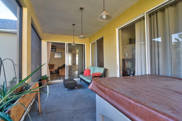 view of patio / terrace featuring a hot tub