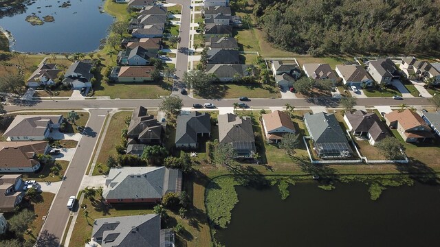 aerial view featuring a water view and a residential view