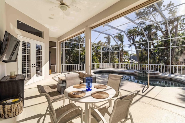 sunroom featuring french doors