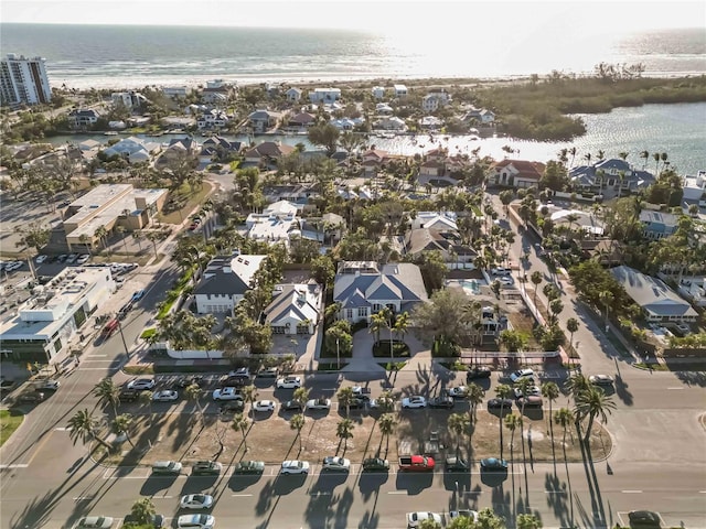 bird's eye view with a water view and a residential view