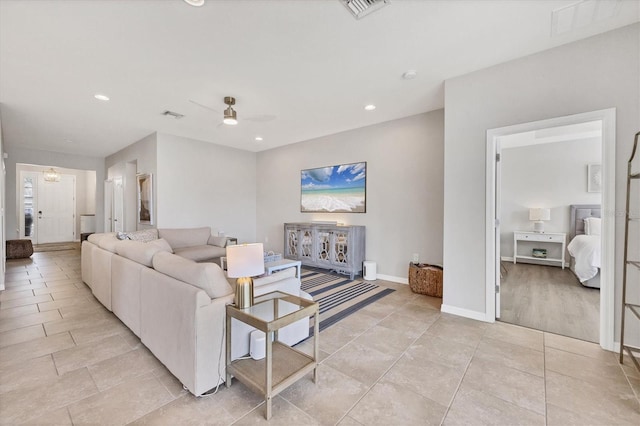 5333 Charlie Brown Ln, Sarasota, FL 34233 - living area featuring ceiling fan, light tile patterned flooring, recessed lighting, and baseboards