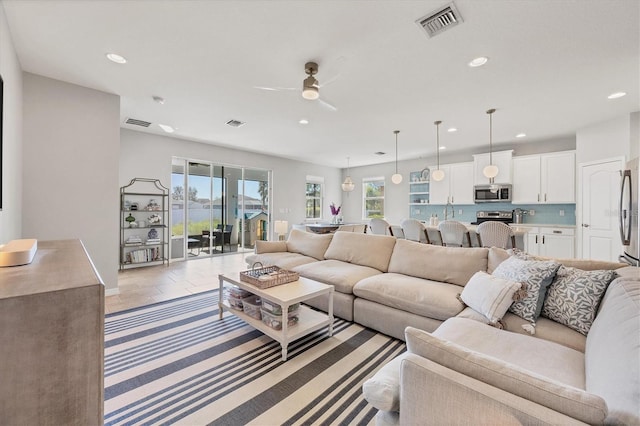 5333 Charlie Brown Ln, Sarasota, FL 34233 - living room featuring recessed lighting and ceiling fan
