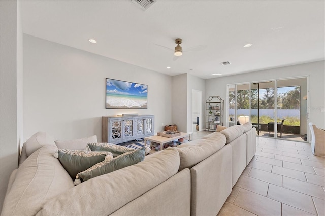 5333 Charlie Brown Ln, Sarasota, FL 34233 - living area featuring ceiling fan, light tile patterned floors, and recessed lighting