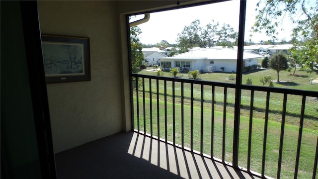 balcony featuring a residential view